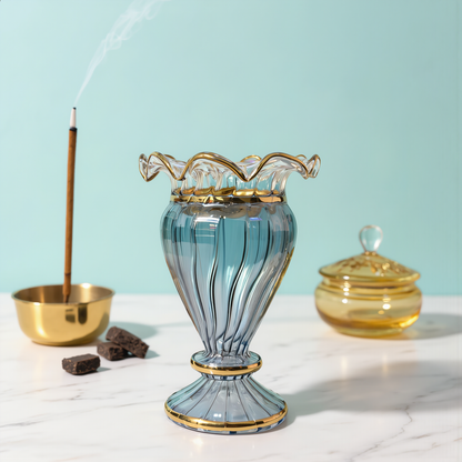 Blue Egyptian glass mabkhara with a gold ruffled rim and gilded pedestal foot