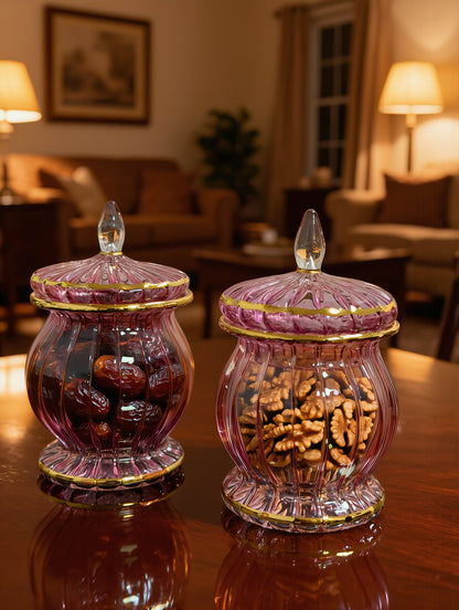 Rose pink Egyptian glass jars with 24K gold rims holding dates and walnuts