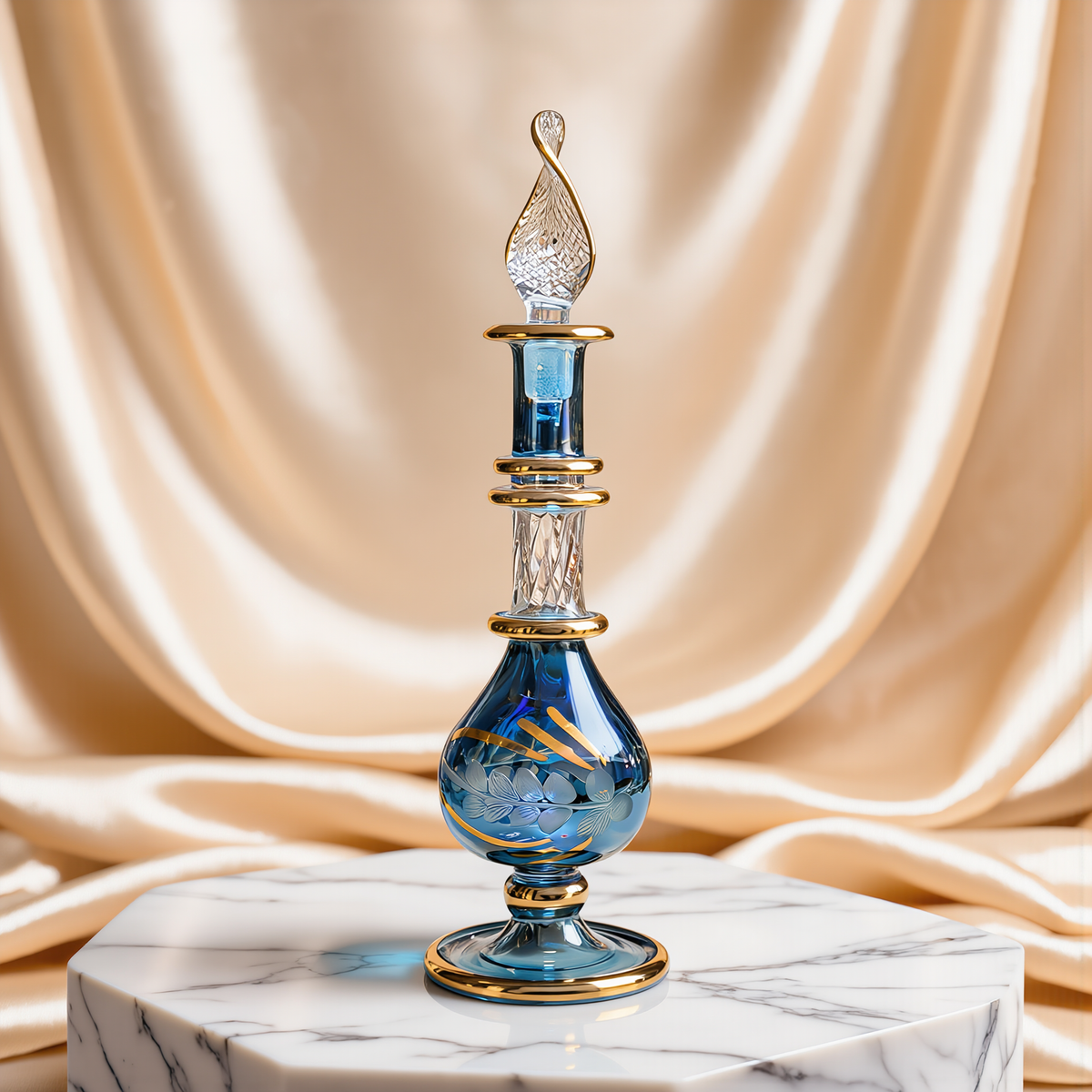 Small blue hand-blown Egyptian glass perfume bottle on white marble